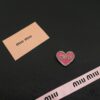 6930169612f62673a6facc1d Miu Miu Textured Heart Luxury Pearl Brooch, Minimalist Love Design, Vintage-Inspired Fashion Statement Piece