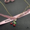 693016a212f62673a6facc2c Miu Miu Textured Heart Luxury Minimalist Pearl Necklace, Chic Retro Design with Pearl Accents, Must-Have Summer Accessory
