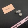 693016a412f62673a6facc30 Miu Miu Textured Luxury Pearl Heart Brooch, Minimalist Love Design with Vintage Charm