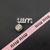 693016a712f62673a6facc33 Miu Miu Textured Luxury Pearl Heart Brooch, Minimalist Love Design with Vintage Charm