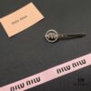 693016a812f62673a6facc35 Miu Miu Textured Luxe Love-Themed Pearl Heart Hair Clip, Minimalist Design with Vintage Charm