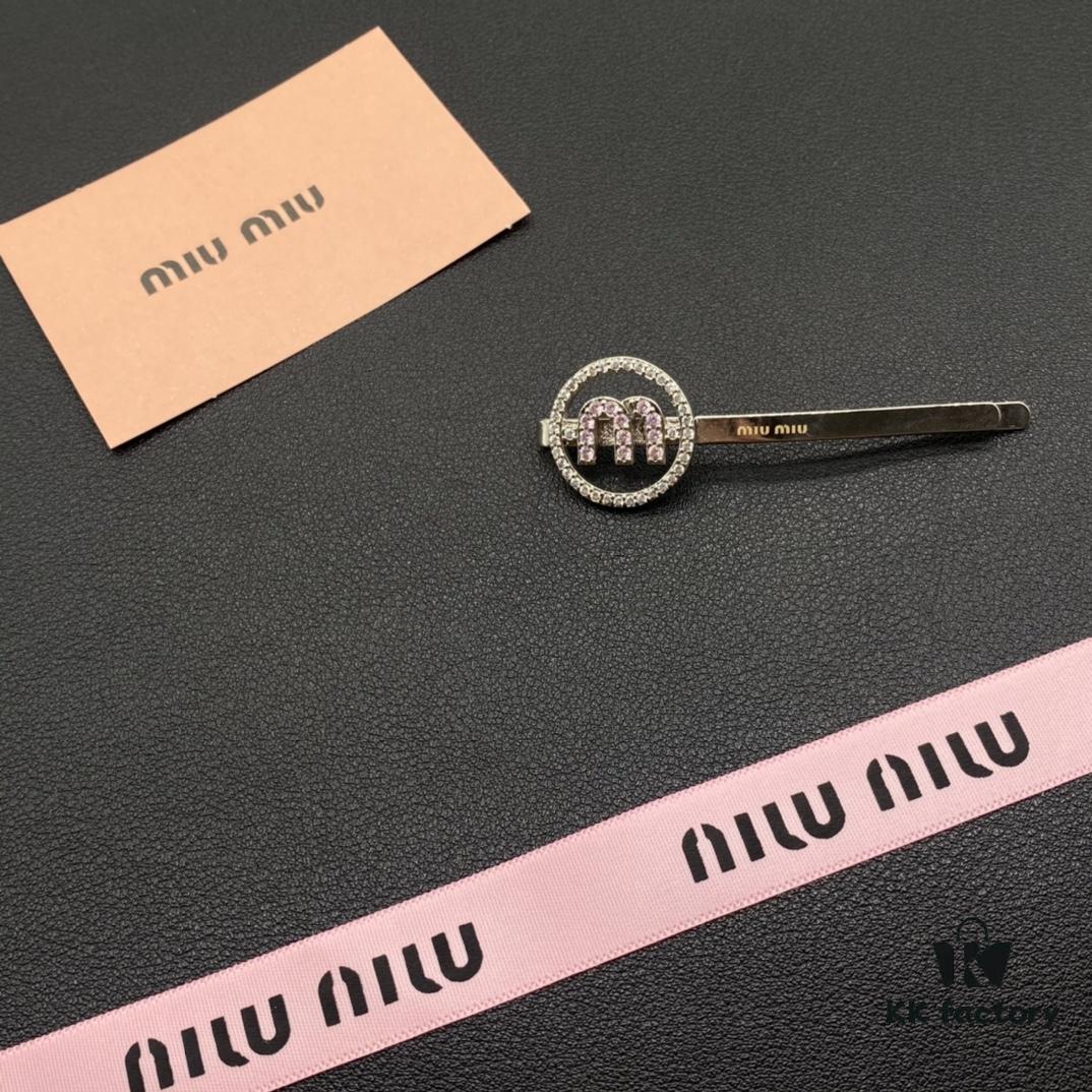 693016a812f62673a6facc35 Miu Miu Textured Luxe Love-Themed Pearl Heart Hair Clip, Minimalist Design with Vintage Charm