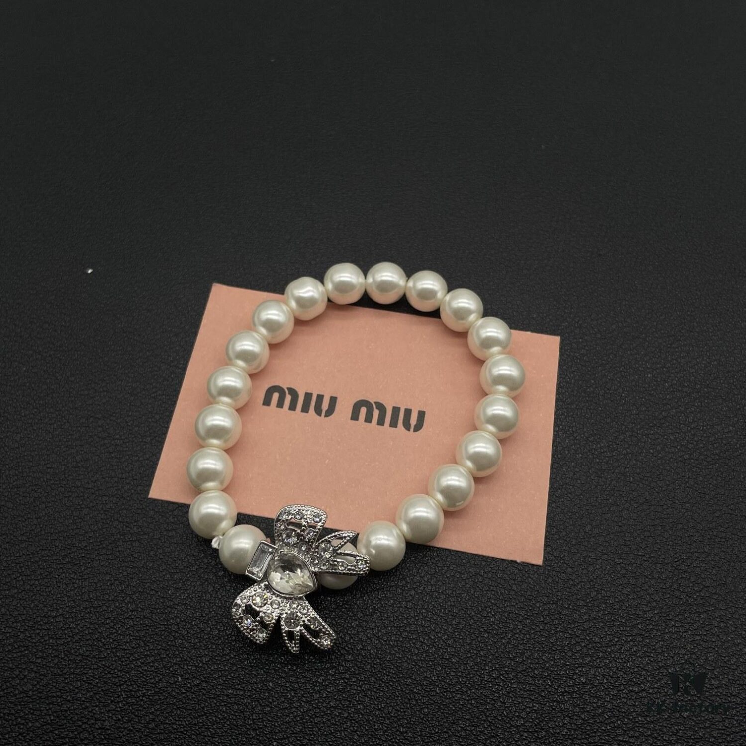 693016a912f62673a6facc36 Miumiu Elegant Heart Pearl Bracelet, Luxury Minimalist Design with Vintage Charm