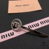 693016aa12f62673a6facc37 Miu Miu Textured Luxe Love-Themed Pearl Heart Hair Clip, Minimalist Design with Vintage Charm