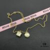 693016ad12f62673a6facc3b Miu Miu Textured Luxurious Pearl Heart Stud Earrings, Minimalist Design with Vintage Charm, Must-Have Summer Fashion Accessory