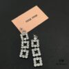693016af12f62673a6facc3d Miu Miu Textured Luxurious Pearl Heart Stud Earrings, Minimalist Design with Vintage Charm, Must-Have Summer Fashion Accessory