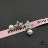 693016b712f62673a6facc44 Miu Miu Textured Luxury Pearl Heart Stud Earrings, Minimalist Love Design, Vintage-Inspired Fashion Statement Piece
