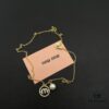 693016bf12f62673a6facc4d Miu Miu Textured Luxury Pearl Heart Necklace, Minimalist Design with Retro Elegance