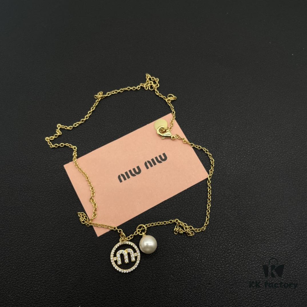 693016bf12f62673a6facc4d Miu Miu Textured Luxury Pearl Heart Necklace, Minimalist Design with Retro Elegance