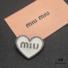 693016c412f62673a6facc51 Miu Miu Textured Luxury Pearl Heart Brooch, Minimalist Amour Design with Vintage Charm, Must-Have Fashion Accessory for Summer