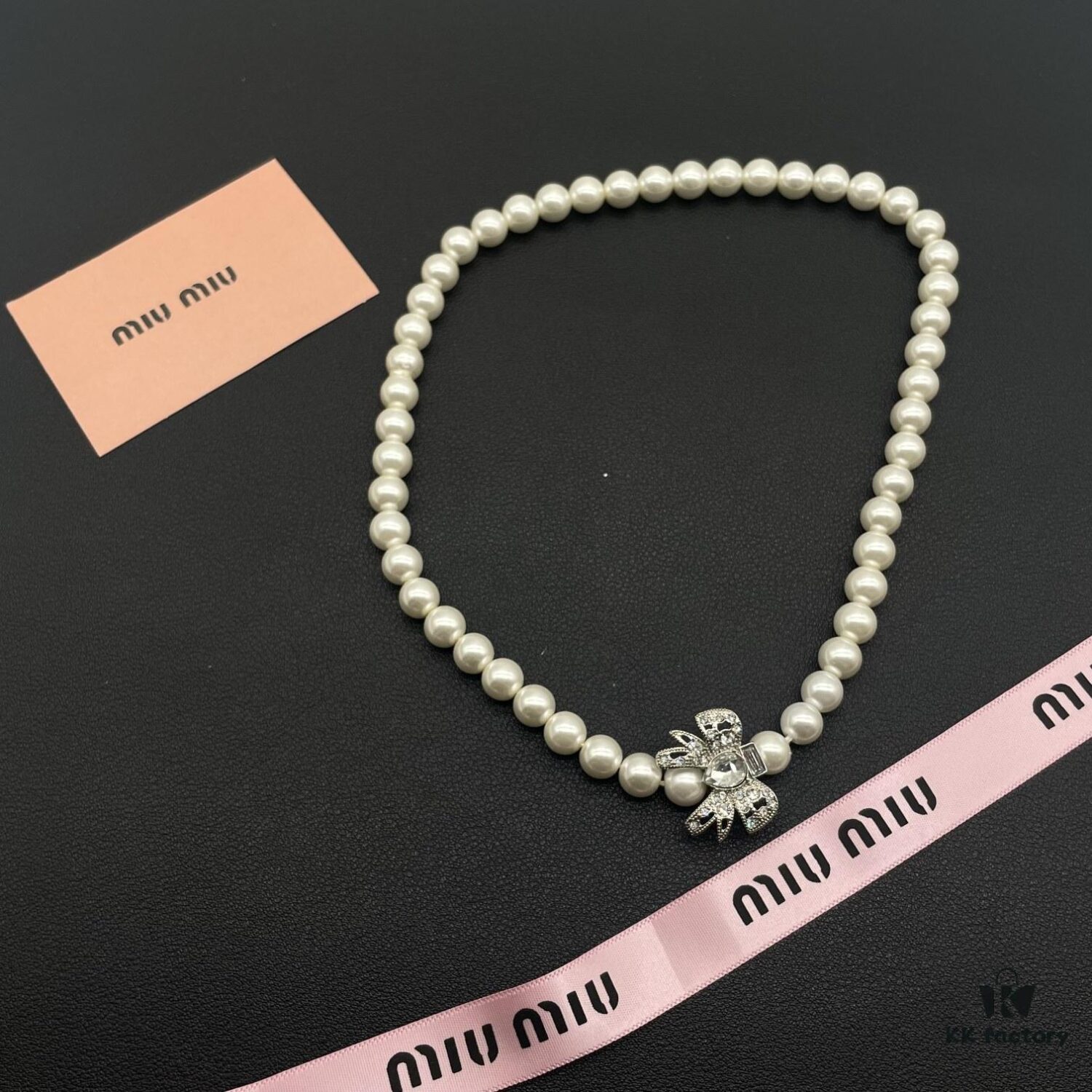 693016ca12f62673a6facc5b Miu Miu Textured Luxe Minimalist Pearl Heart Necklace, Small Vintage Fashion Statement Piece