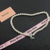 693016cd12f62673a6facc5d Miu Miu Textured Luxe Minimalist Pearl Heart Necklace, Small Vintage Fashion Statement Piece
