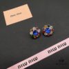 693016d312f62673a6facc63 Miu Miu Elegant Heart Pearl Ear Cuffs – Minimalist Luxury Design with Vintage Charm