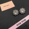 693016d712f62673a6facc67 Miu Miu Textured Luxury Pearl Heart Ear Cuffs, Minimalist Design with Vintage Charm, Must-Have Summer Fashion Accessory