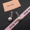 693016ea12f62673a6facc78 Miu Miu Textured Luxury Pearl Heart Stud Earrings, Minimalist Design with Retro Charm, Must-Have Fashion Accessory for Summer