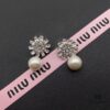 693016f012f62673a6facc7e Miu Miu Textured Luxurious Pearl Heart Stud Earrings, Minimalist Design with Vintage Charm, Must-Have Summer Fashion Accessory