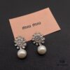 693016f112f62673a6facc80 Miu Miu Textured Luxurious Pearl Heart Stud Earrings, Minimalist Design with Vintage Charm, Must-Have Summer Fashion Accessory