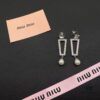 693016f312f62673a6facc81 Miu Miu Textured Luxury Pearl Heart Stud Earrings, Minimalist Design with Vintage Charm, Must-Have Summer Fashion Accessory