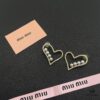 6930170a12f62673a6facc98 Miu Miu Textured Luxurious Pearl Heart Stud Earrings, Minimalist Design with Vintage Charm, Must-Have Summer Fashion Accessory