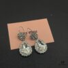 6930170b12f62673a6facc9a Miu Miu Textured Luxurious Pearl Heart Stud Earrings, Minimalist Design with Vintage Charm