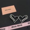 6930170b12f62673a6facc9b Miu Miu Textured Luxury Pearl Heart Stud Earrings, Minimalist Design with Vintage Charm, Must-Have Summer Fashion Accessory