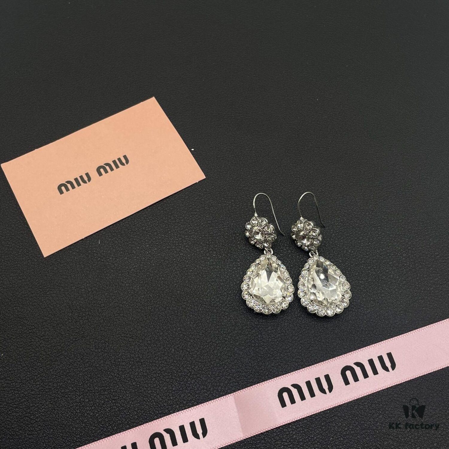 6930171012f62673a6facc9e Miu Miu Textured Luxurious Pearl Heart Stud Earrings, Minimalist Design with Vintage Charm