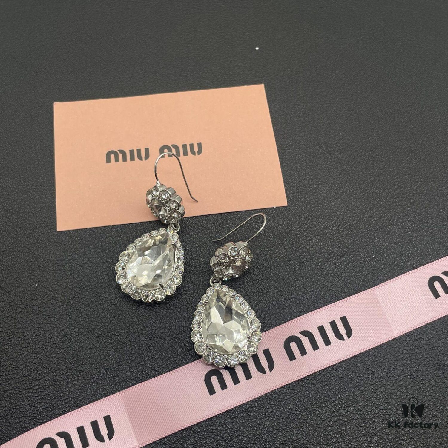 6930171112f62673a6facc9f Miu Miu Textured Luxurious Pearl Heart Stud Earrings, Minimalist Design with Vintage Charm