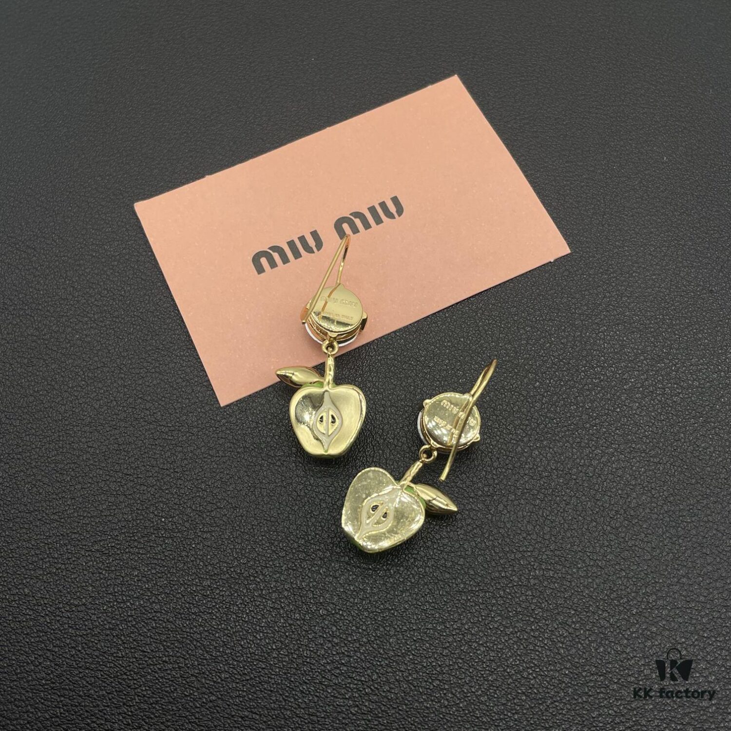 6930171112f62673a6facca1 Miumiu Pearl Heart Stud Earrings, Minimalist Luxury Design with Retro Charm