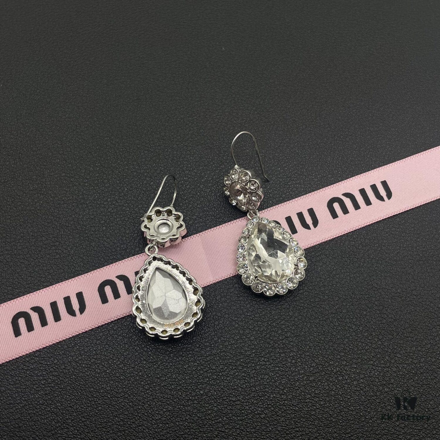 6930171312f62673a6facca3 Miu Miu Textured Luxurious Pearl Heart Stud Earrings, Minimalist Design with Vintage Charm