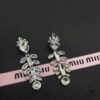6930172112f62673a6faccb5 Miu Miu Elegant Heart Pearl Stud Earrings, Minimalist Luxury Design with Vintage Charm