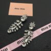 6930172312f62673a6faccba Miu Miu Elegant Heart Pearl Stud Earrings, Minimalist Luxury Design with Vintage Charm