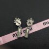 6930172412f62673a6faccbb Miu Miu Elegant Heart Pearl Stud Earrings, Minimalist Luxury Design with Timeless Charm