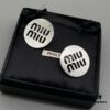 Miu Miu Textured Luxurious Pearl Heart Stud Earrings, Minimalist Design with Vintage Charm