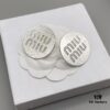 Miu Miu Textured Luxurious Pearl Heart Stud Earrings, Minimalist Design with Vintage Charm