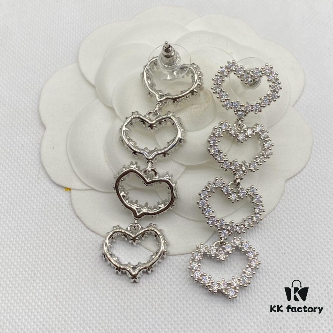 6930175a12f62673a6faccfe Miu Miu Textured Luxe Minimalist Pearl Heart Stud Earrings