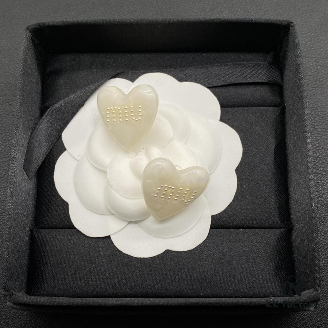 6930175d12f62673a6facd01 Miu Miu Textured Luxury Pearl Heart Stud Earrings, Minimalist Design with Vintage Charm, Must-Have Summer Fashion Accessory