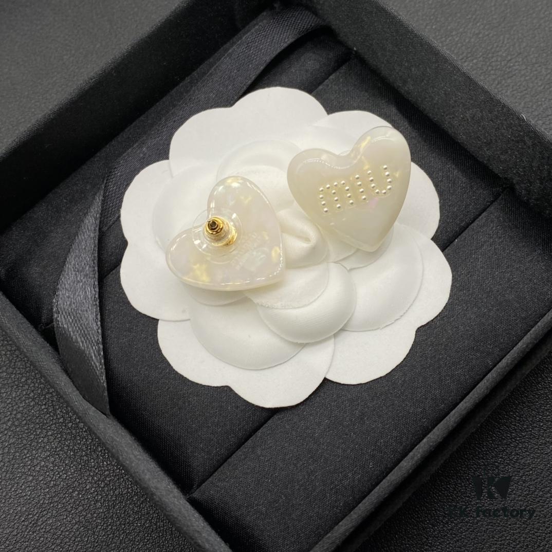 6930175e12f62673a6facd05 Miu Miu Textured Luxury Pearl Heart Stud Earrings, Minimalist Design with Vintage Charm, Must-Have Summer Fashion Accessory