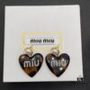 6930176312f62673a6facd09 Miu Miu Textured Luxury Pearl Heart Stud Earrings, Minimalist Love Design, Fashionable Retro Style, Must-Have Summer Accessory