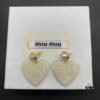 6930176912f62673a6facd0f Miu Miu Textured Luxurious Pearl Heart Stud Earrings, Minimalist Design with Vintage Charm, Must-Have Summer Fashion Accessory