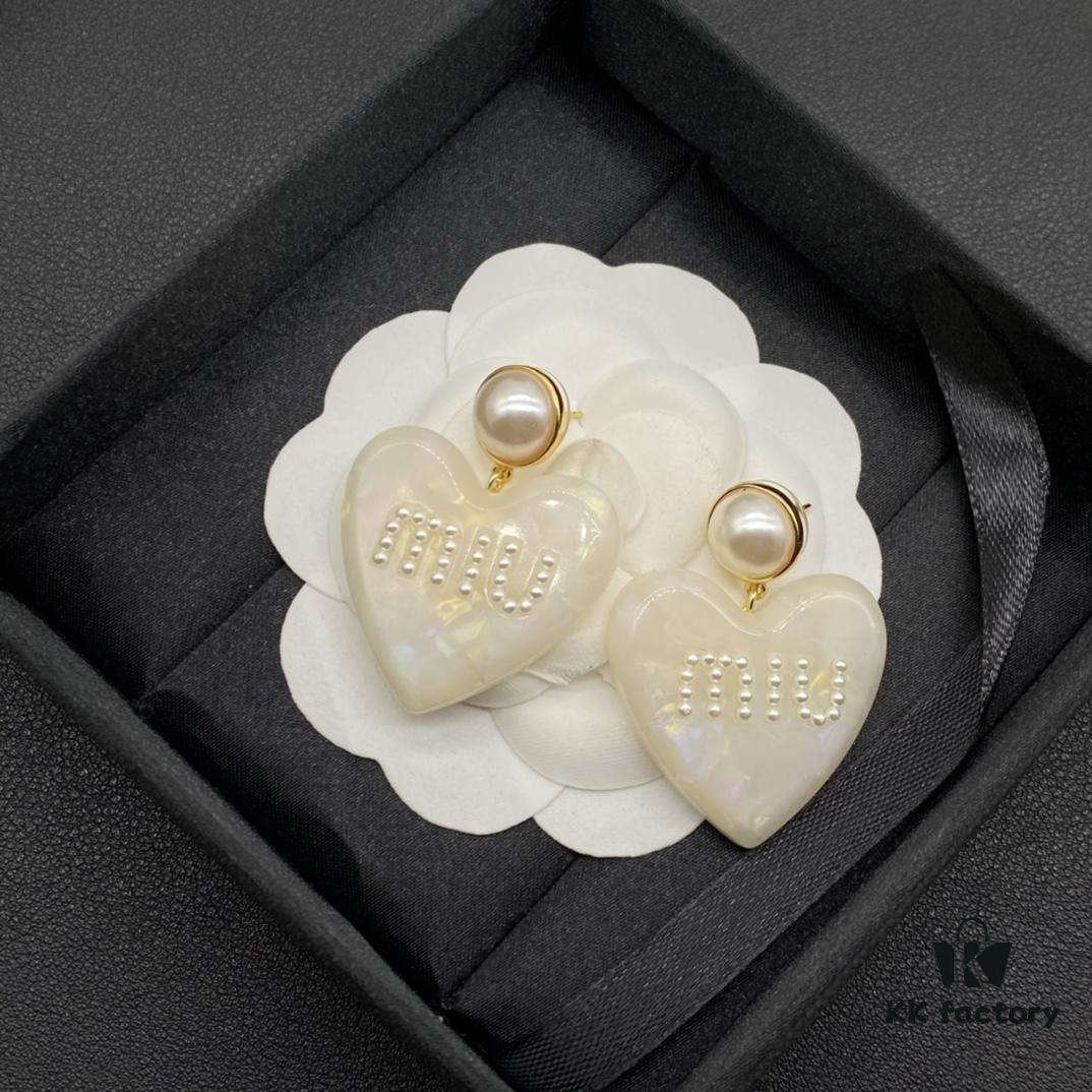 6930176a12f62673a6facd10 Miu Miu Textured Luxurious Pearl Heart Stud Earrings, Minimalist Design with Vintage Charm, Must-Have Summer Fashion Accessory