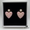 6930176d12f62673a6facd12 Miu Miu Textured Luxury Pearl Heart Stud Earrings, Minimalist Amore Design with Vintage Charm