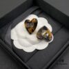 6930176d12f62673a6facd14 Miu Miu Textured Luxurious Pearl Heart Stud Earrings, Minimalist Design with Vintage Charm, Must-Have Summer Fashion Accessory