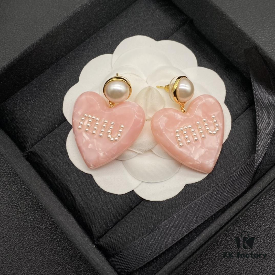 6930176f12f62673a6facd16 Miu Miu Textured Luxury Pearl Heart Stud Earrings, Minimalist Amore Design with Vintage Charm