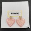6930177212f62673a6facd1b Miu Miu Textured Luxury Pearl Heart Stud Earrings, Minimalist Amore Design with Vintage Charm