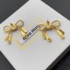 6930177912f62673a6facd24 Miu Miu Textured Luxury Pearl Heart Stud Earrings, Minimalist Design with Retro Charm
