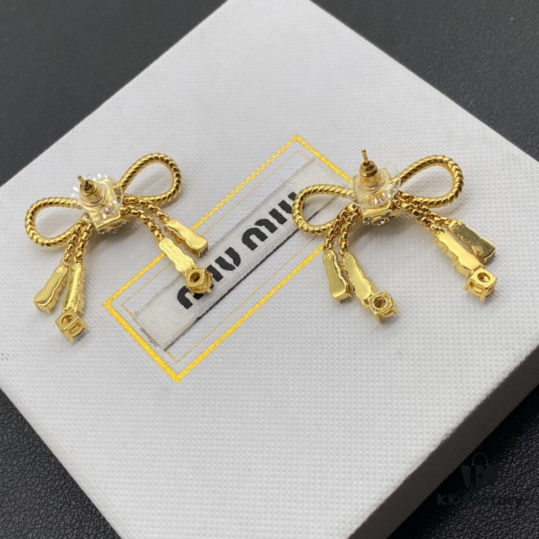 6930177912f62673a6facd24 Miu Miu Textured Luxury Pearl Heart Stud Earrings, Minimalist Design with Retro Charm