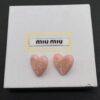 6930177a12f62673a6facd25 Miu Miu Textured Luxurious Pearl Heart Stud Earrings, Minimalist Design with Vintage Charm, Must-Have Summer Fashion Accessory