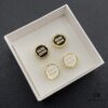 6930177b12f62673a6facd26 Miu Miu Textured Luxurious Pearl Heart Stud Earrings, Minimalist Design with Vintage Charm, Must-Have Summer Fashion Accessory