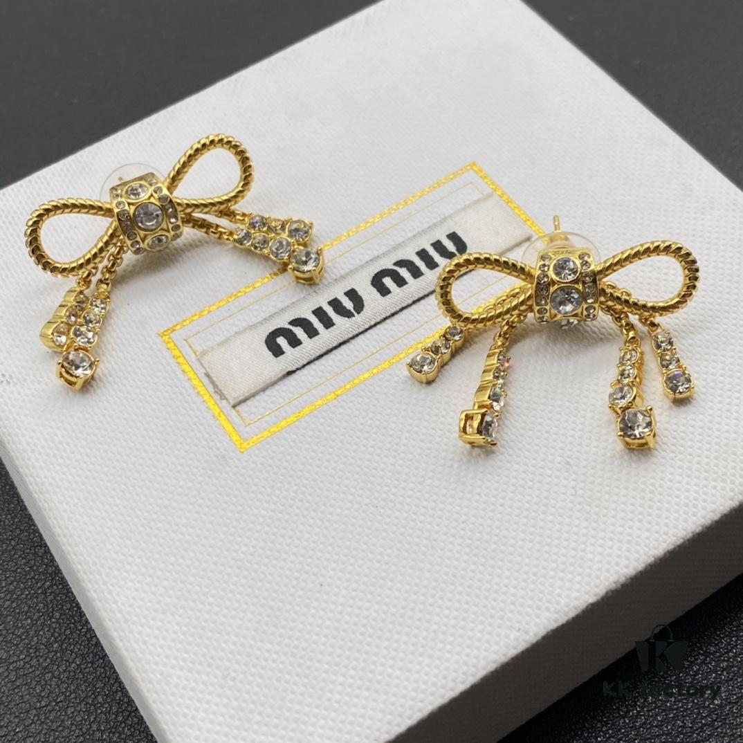 6930177c12f62673a6facd27 Miu Miu Textured Luxury Pearl Heart Stud Earrings, Minimalist Design with Retro Charm