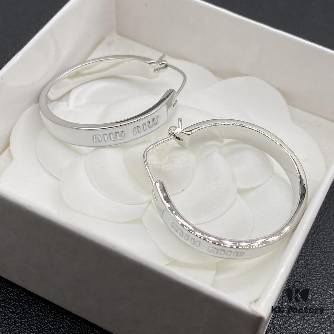 6930178612f62673a6facd3c Miu Miu Textured Luxurious Pearl Heart Stud Earrings, Minimalist Design with Vintage Charm